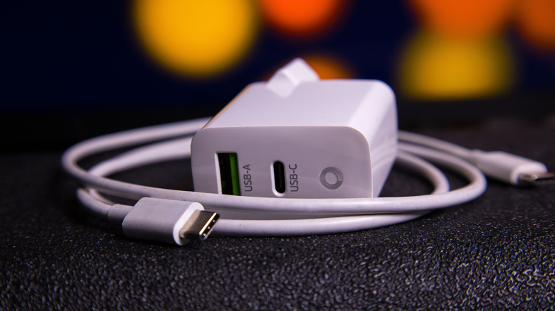 A USB-C charger with a cable wrapped around it