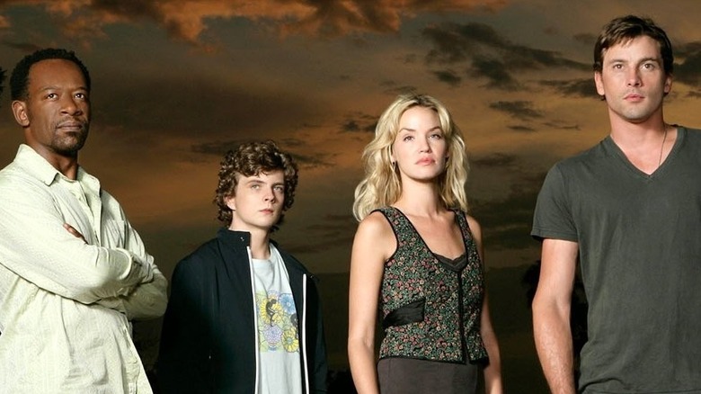 Cast members from the show "Jericho" posing in a poster
