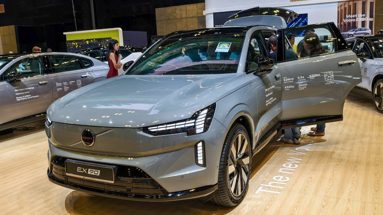 The Volvo EX90 displayed indoors at a dealership.
