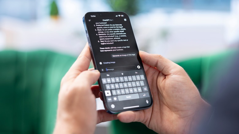 hands holding a phone with the ChatGPT app open