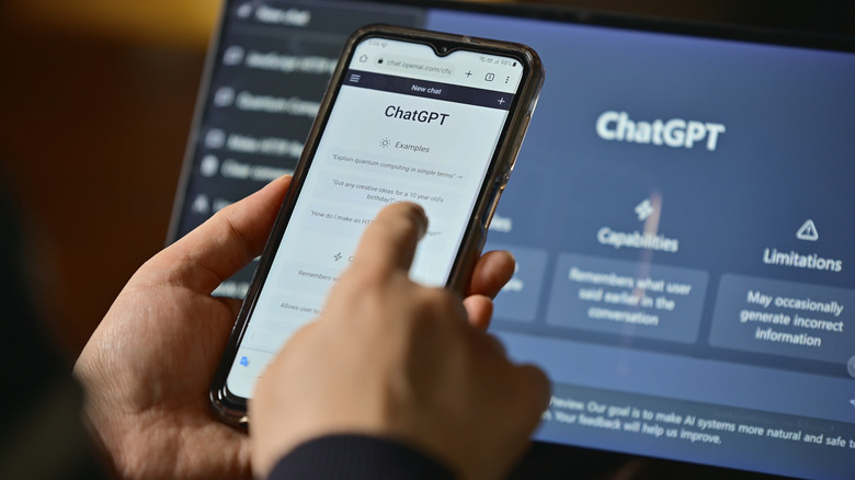 a person using chatgpt on their phone and computer screen
