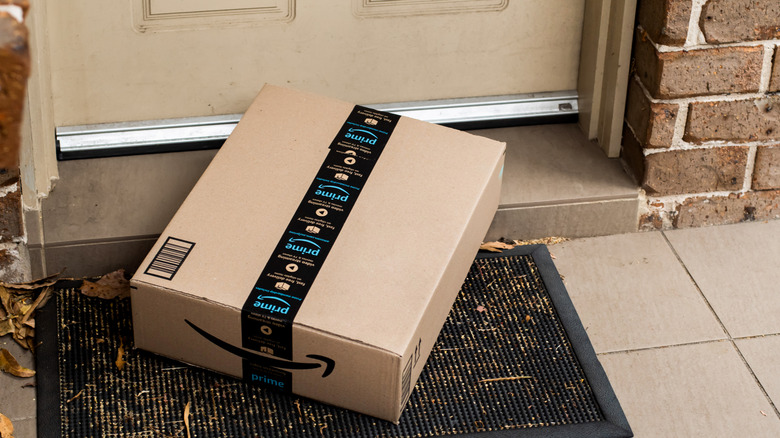 an amazon box on a doorstep