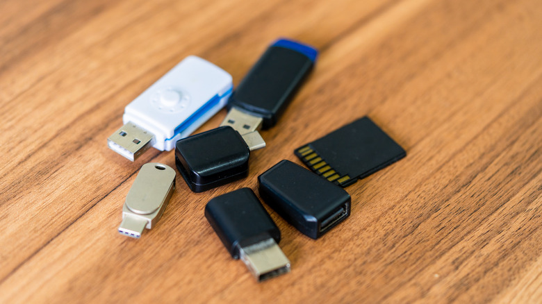 Several different kinds of USB adapters on a table
