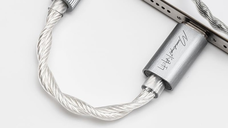 The Moondrop Echo-A DAC plugged into an iPhone