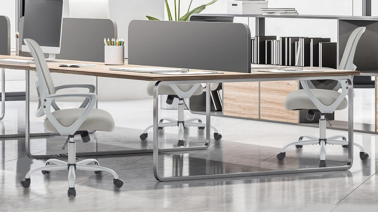 Several Sweetcrispy executive chairs around a conference table