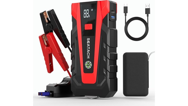 A photo of the Scatach Car Battery Jump Started along with its jumper cables, USB-C cord, and carrying case