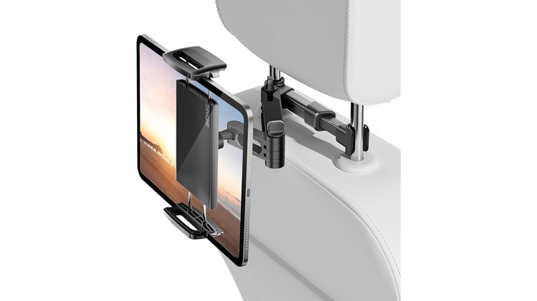 An Amazon photo of a computer rendered Tryone Car Headrest Tablet Holder Mount attached to the back of a headrest