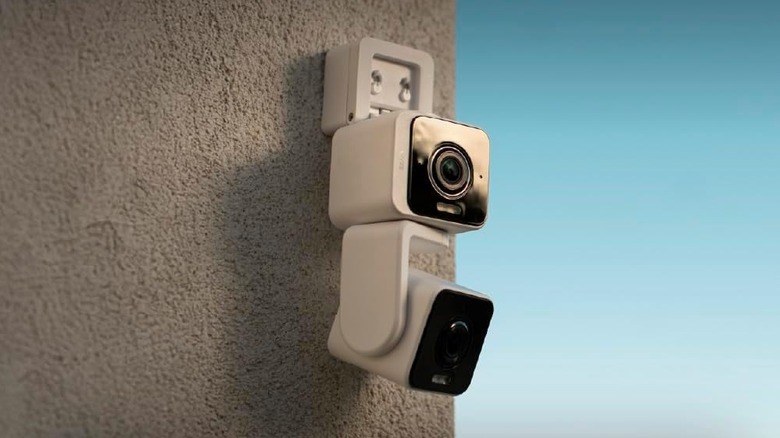 The Wyze Duo Cam Pan mounted on the side of an exterior wall