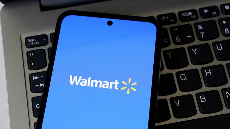 A smartphone screen displaying the Walmart logo