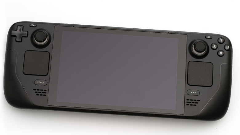 Steam Deck resting on a white background.