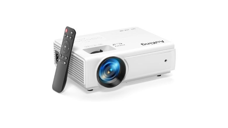 A white AuKing projector with a black remote