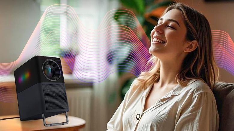 A woman listening to music through the TCL A1.