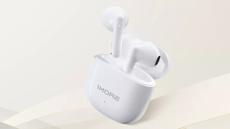 1MORE True Wireless Headphones Q10 are pictured, with charging case.