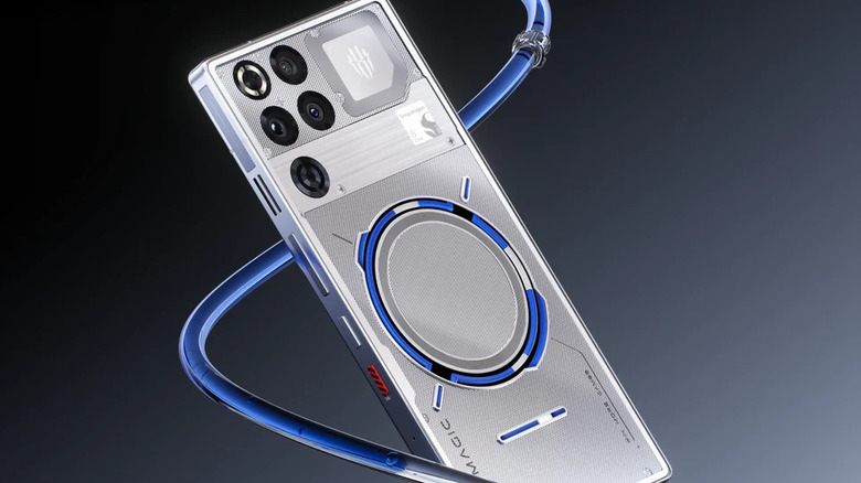 RedMagic 11 Pro gaming phone shown from the back with a transparent design and blue cooling tube.