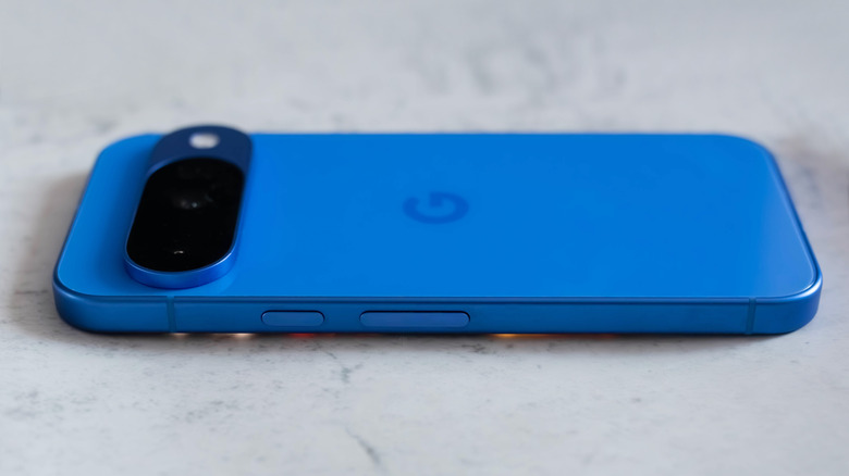 Google Pixel 10 in blue color lying face down.