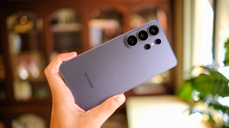 A hand holding a Samsung Galaxy S26 Ultra