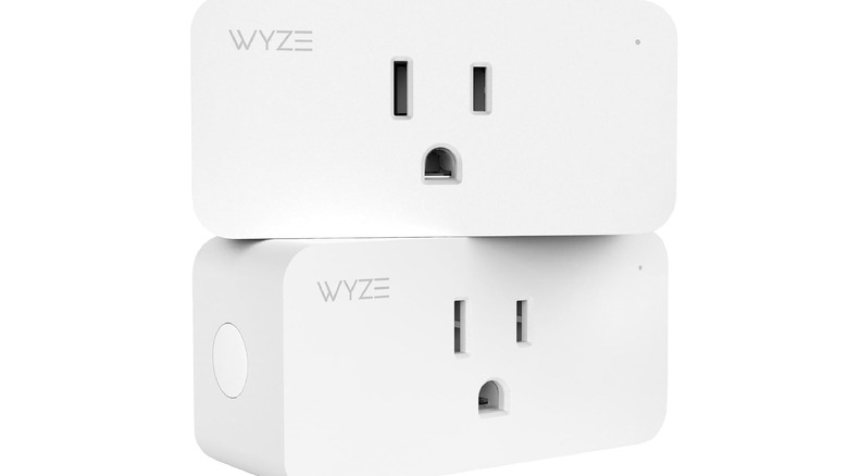 close-up of Wyze smart plugs stacked on top of each other on white background