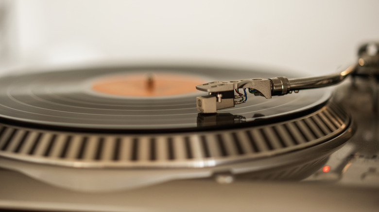 A vintage record player spinning a vinyl record