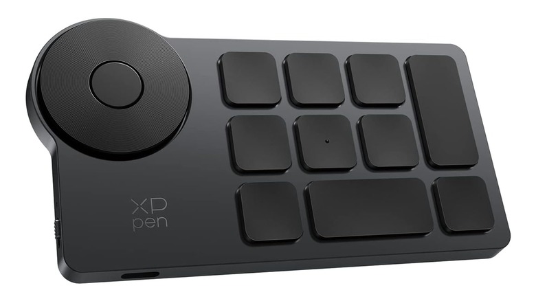A promotional photo for the XPPen Mini Keydial Wireless Shortcut Keyboard