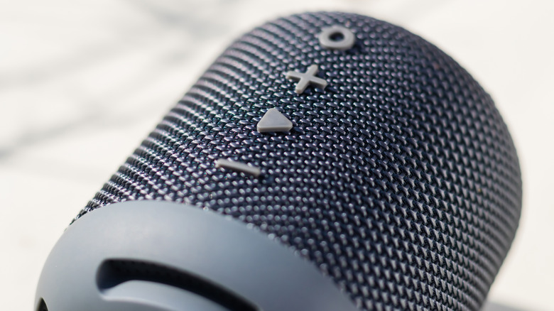 A Bluetooth speaker on a table.