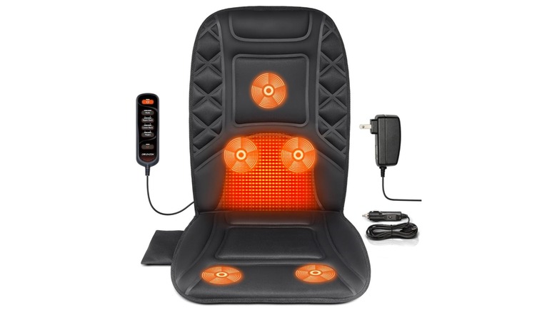 An Amazon promotional photo of the Carshion Heated Back Massager Cover Cushion, the photo displays the unit, its heating capabilities, as well as its power options and controller