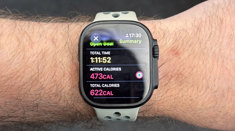 An Apple Watch on a man's arm after showing a complete run workout