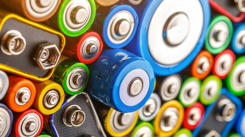 Numerous batteries bunched together to form a mosaic of color