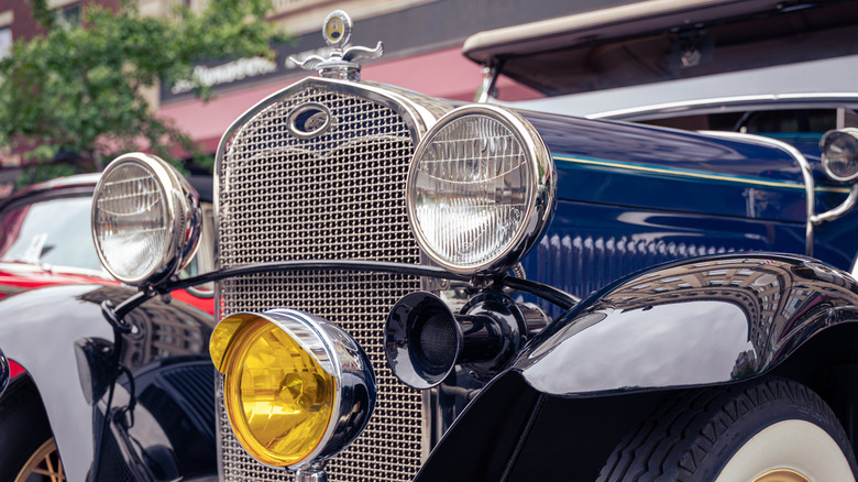 Close up of the front of a restored classic car.