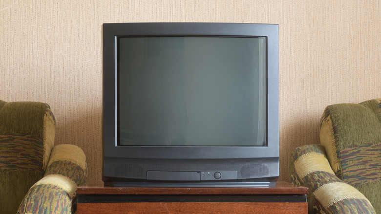 A CRT TV in a living room.