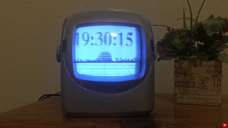 A custom CRT alarm clock on a table.
