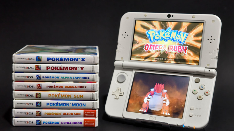 A Nintendo 3DS with Pokemon games