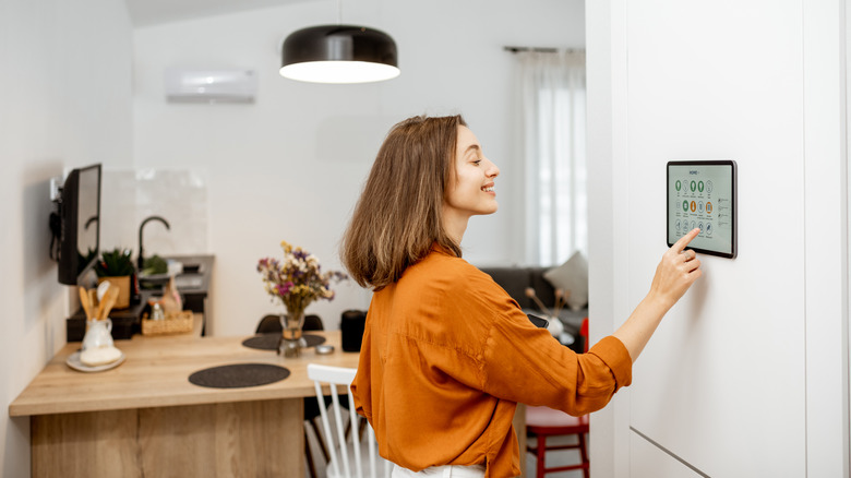 Woman using smart home display