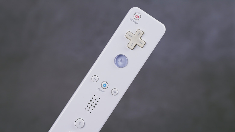 A white Wii Remote on gray background