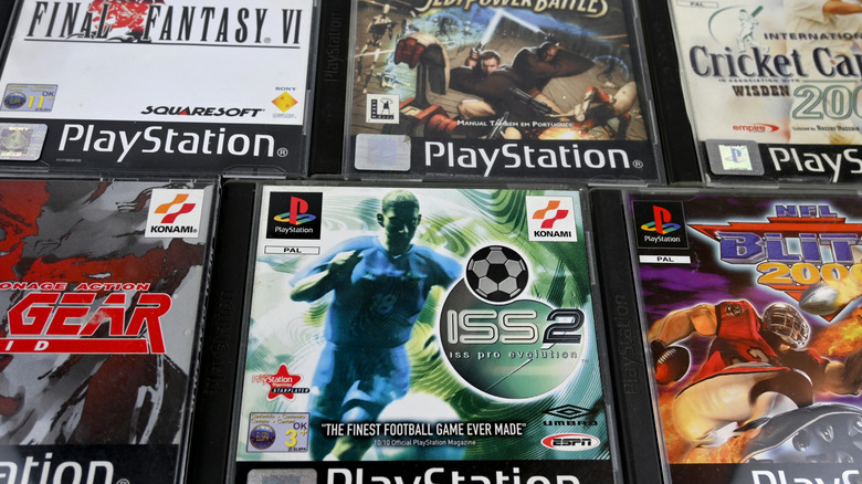 PlayStation 1 games in jewel cases laid out next to each other