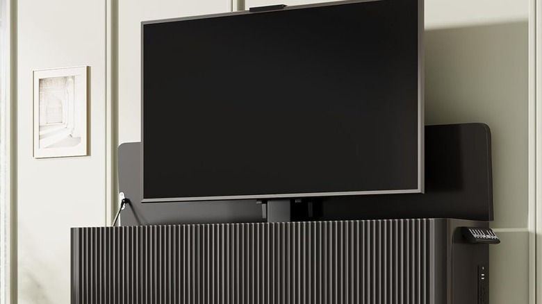 A TV popping out of an Itaar motorized cabinet.