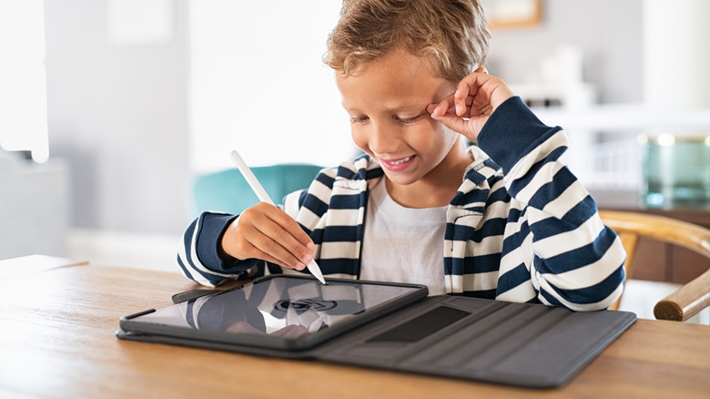 Using a tablet with a cover and stylus