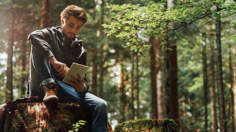 Using a tablet while in the woods