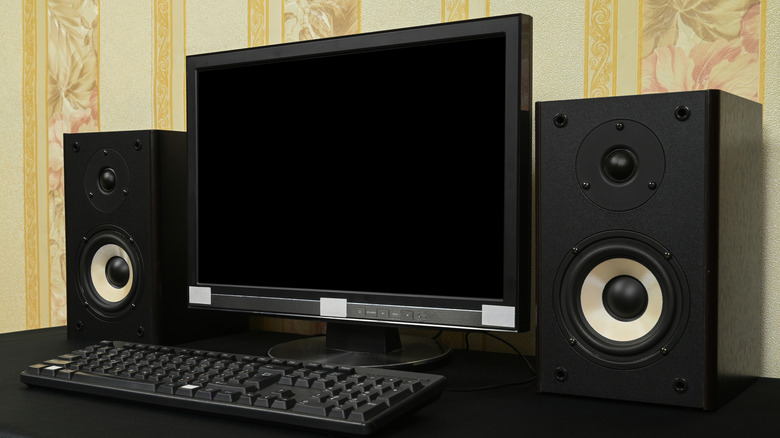 Monitor on a PC desk with no power.