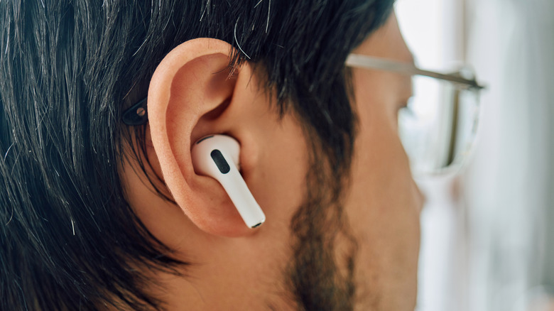 One AirPod inside ear