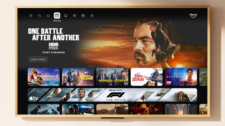 An Amazon Fire TV displaying it's UI, which was redesigned in 2026, the TV is displaying the Home screen, and an advertisement for the film "One Battle After Another" is prominent