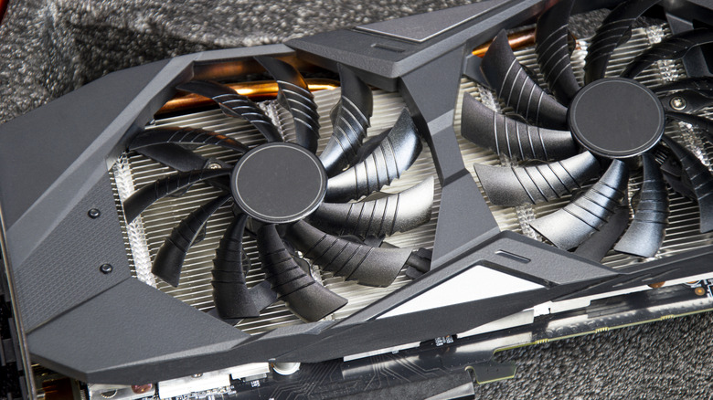 Graphics card with dual cooling fans shown in close-up