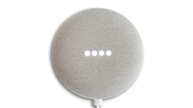 Google Home mini on a white background