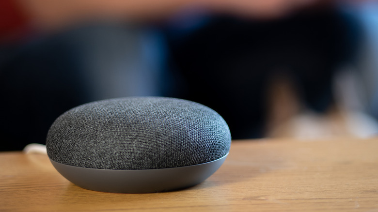 Google Home Mini on a white background
