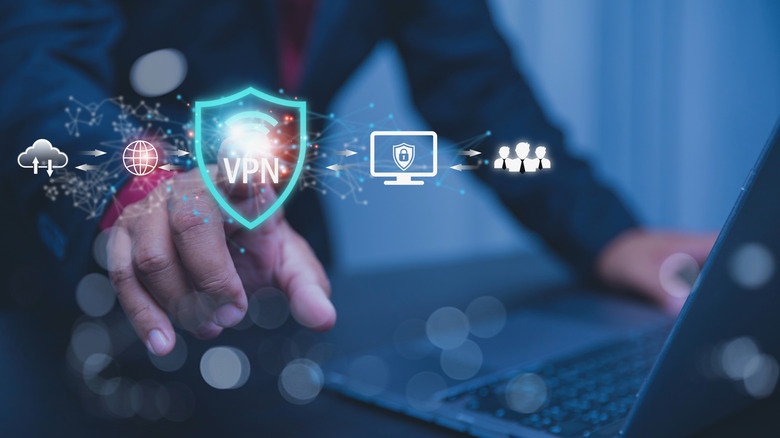 glowing VPN icon with data transfer depiction on the side and a person using a laptop in the background