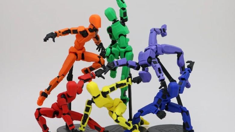 Dummy 13 in (from left to right) Orange, red, green, yellow, purple and blue