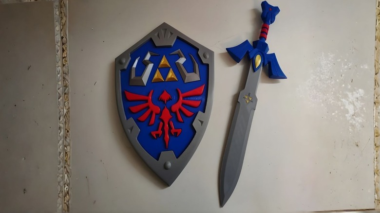 The Hylian Shield (Left) and Master Sword (Right) from the Legend of Zelda: Windwaker