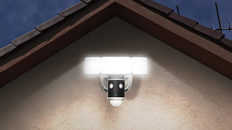 The Feit Smart Dual Lens Panoramic Flood Light mount on a house