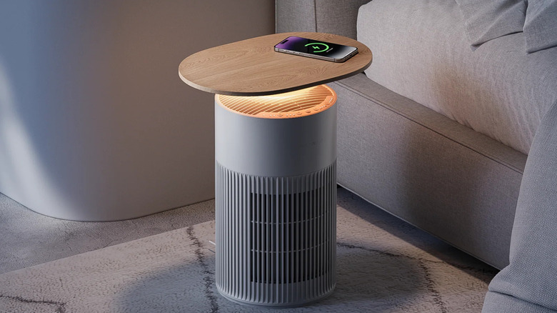 SwitchBot Air Purifier Table charging phone beside bed