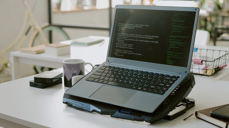 laptop placed on a cooling pad