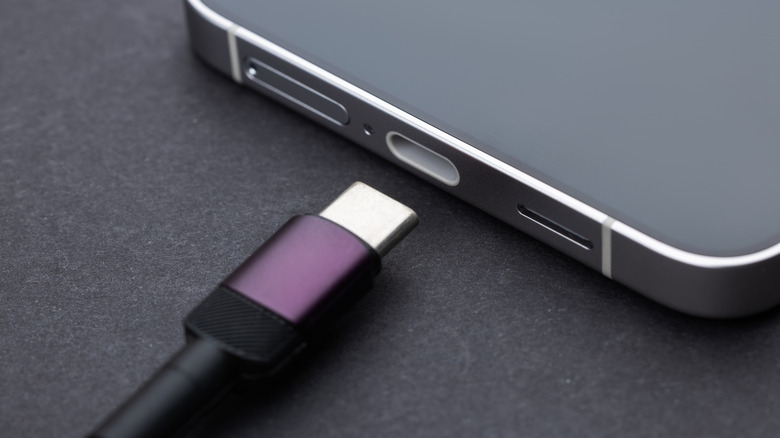 USB-C plug near USB-C port on smartphone